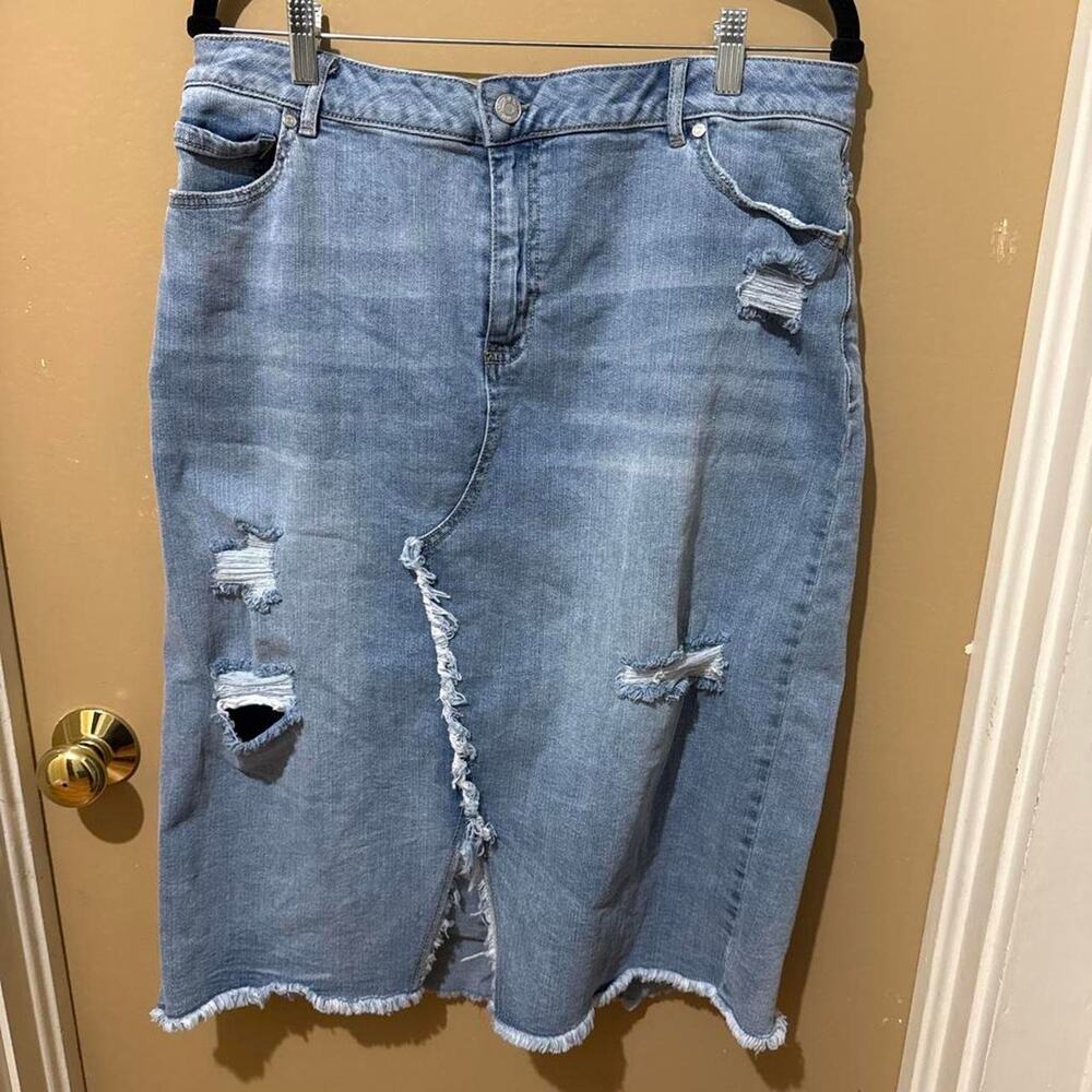 Blue denim skirt with distressed